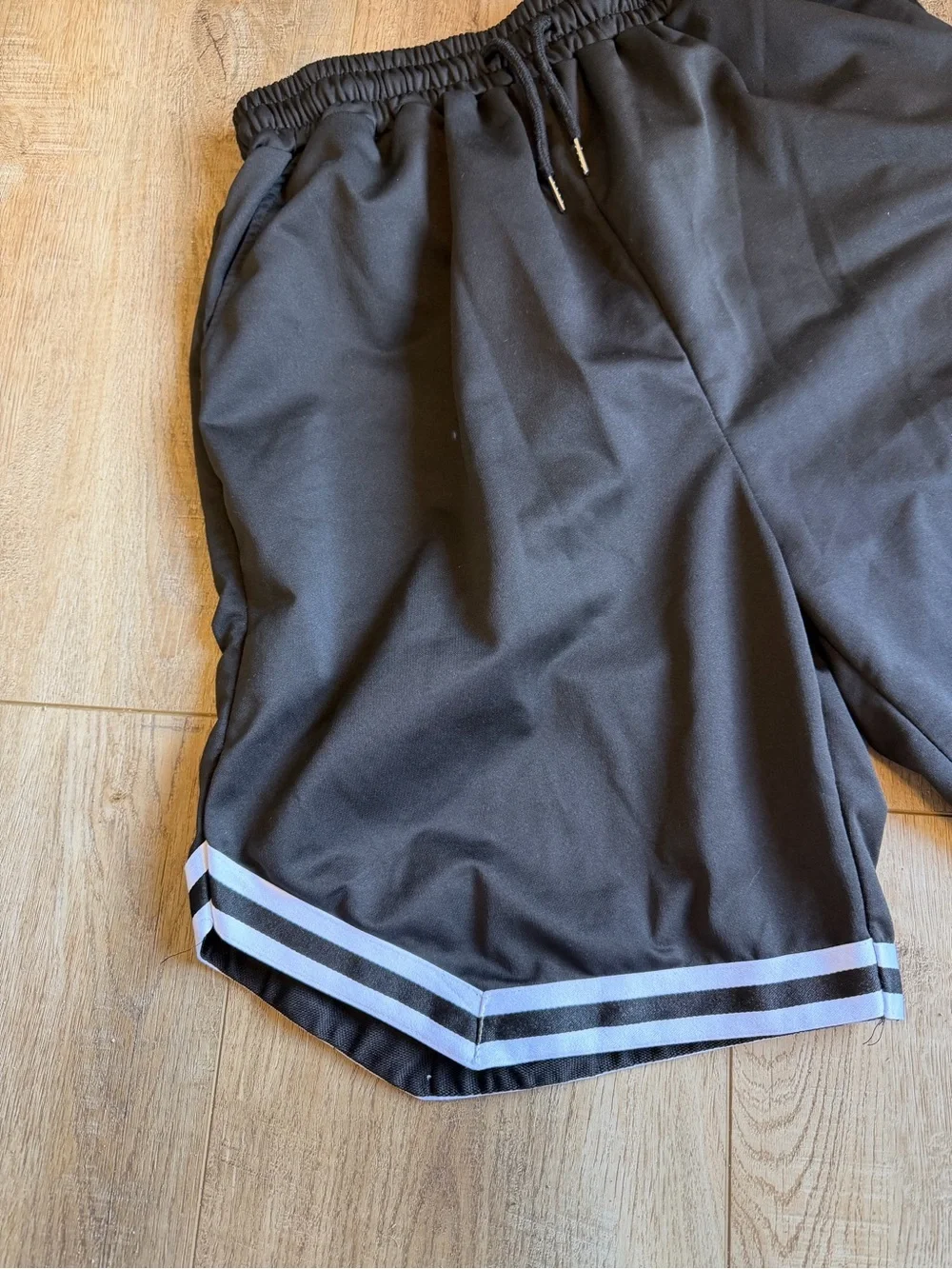 Men's Black Athletic Shorts with Graphic Detail